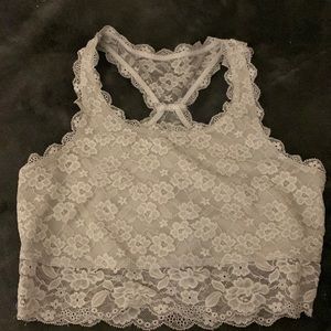 I’m selling a crop top with shirt with flowers